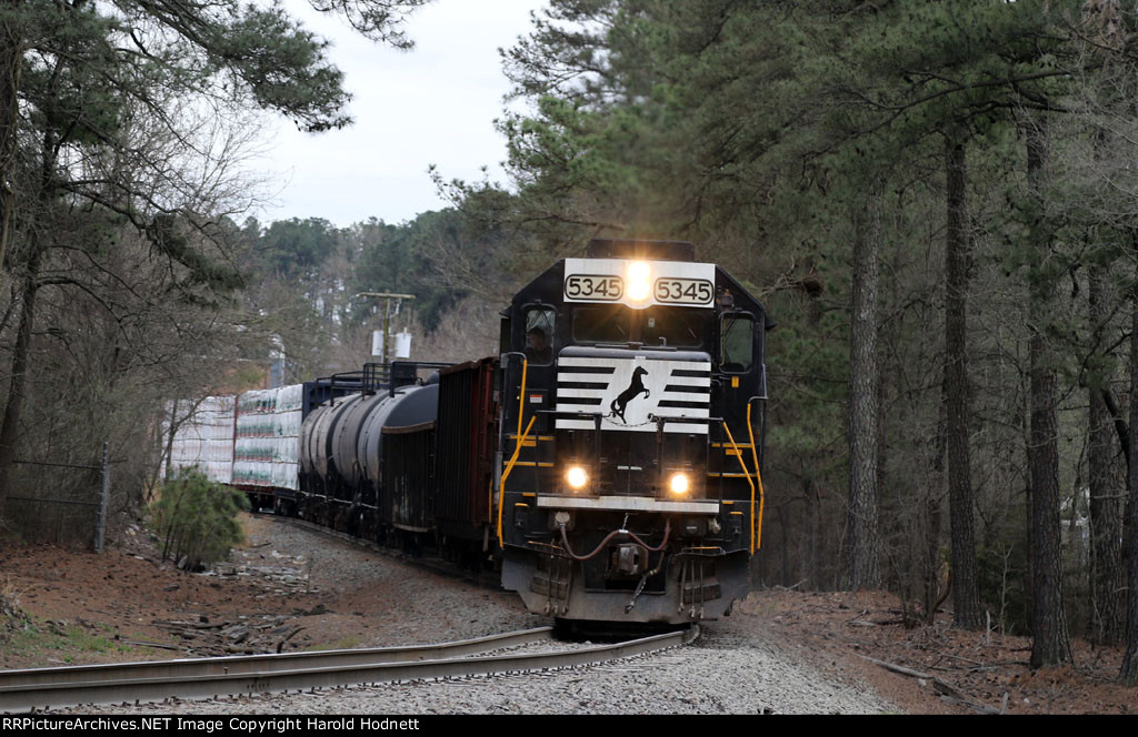 NS 5345 is on the lead of train P07 as it shoves into the yard